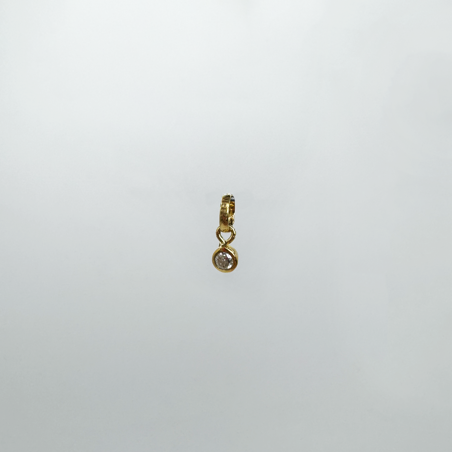 Dije mini diamante y oro 14k.