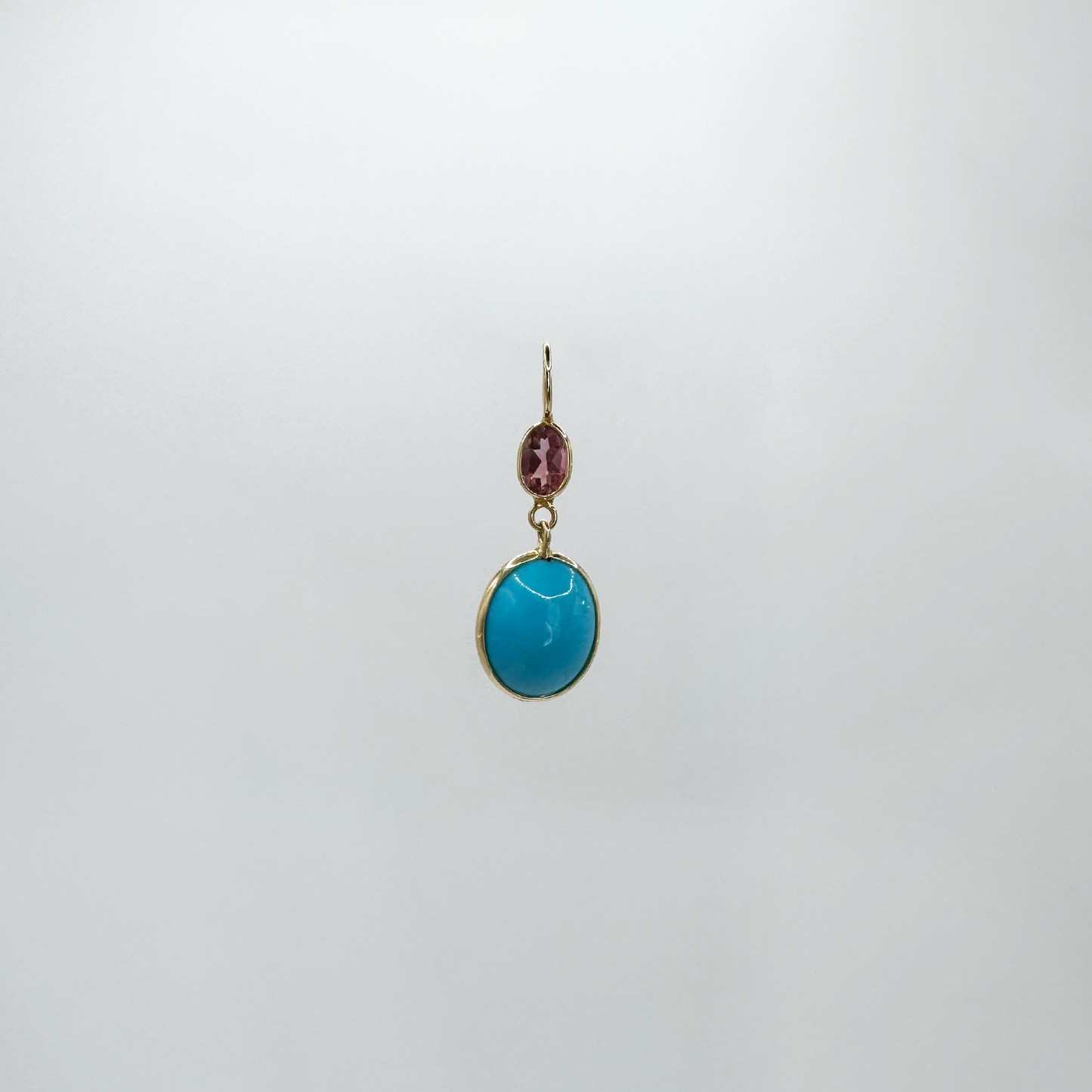 Dije turquesa con turmalina.