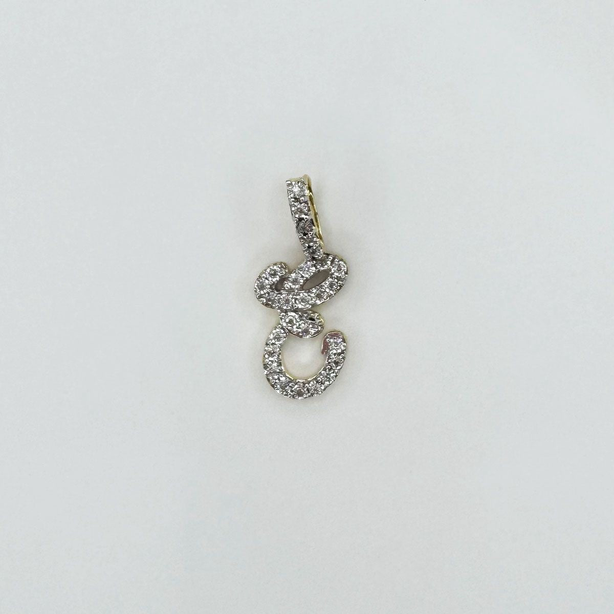 Dije letra "E" XL cursiva en oro y diamantes.